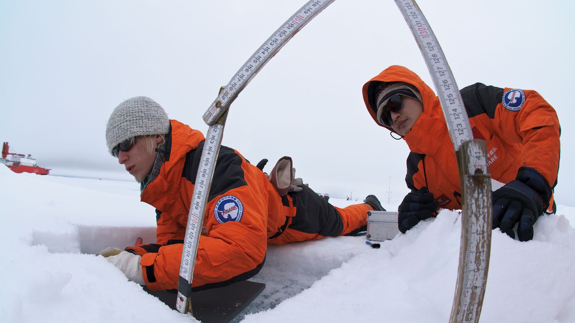 Researchers studying snowpack on the drift ice of the Arctic Ocean during Chinese CHINARE expedition.
