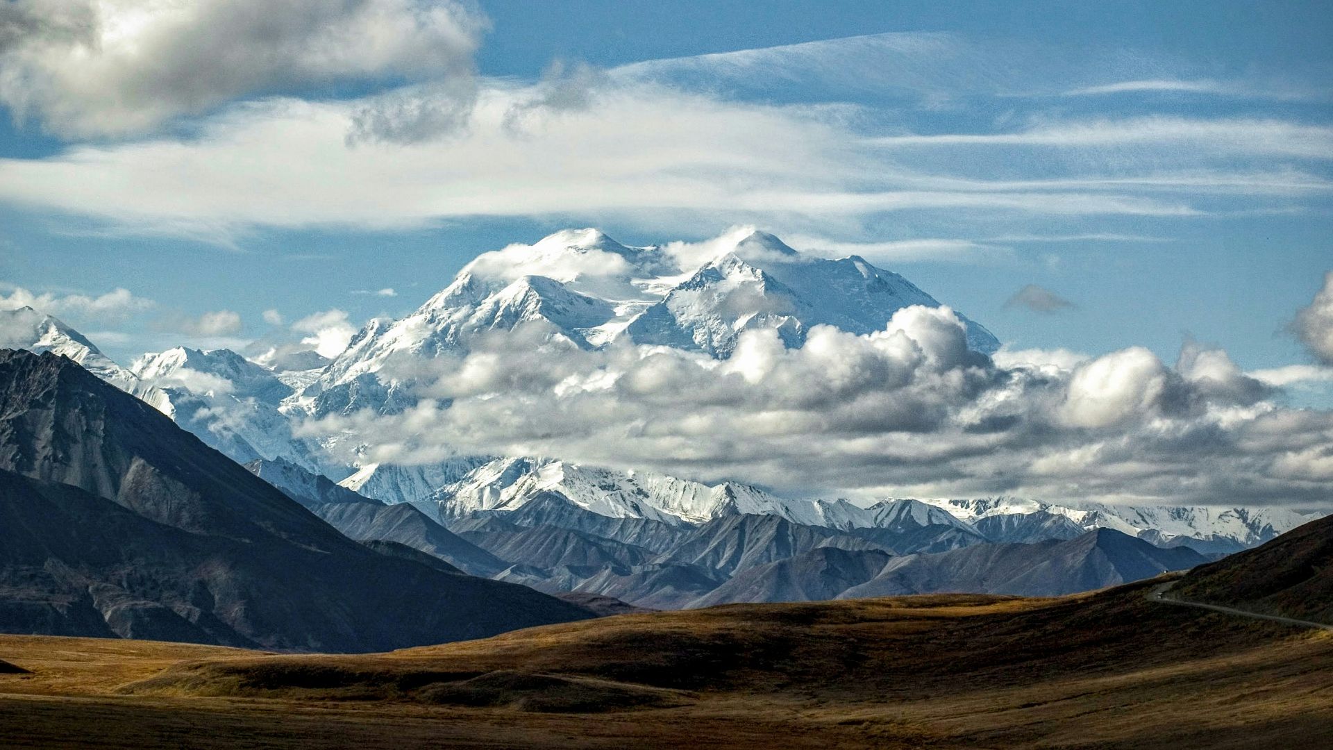 snow covered mountain under blue sky during daytime