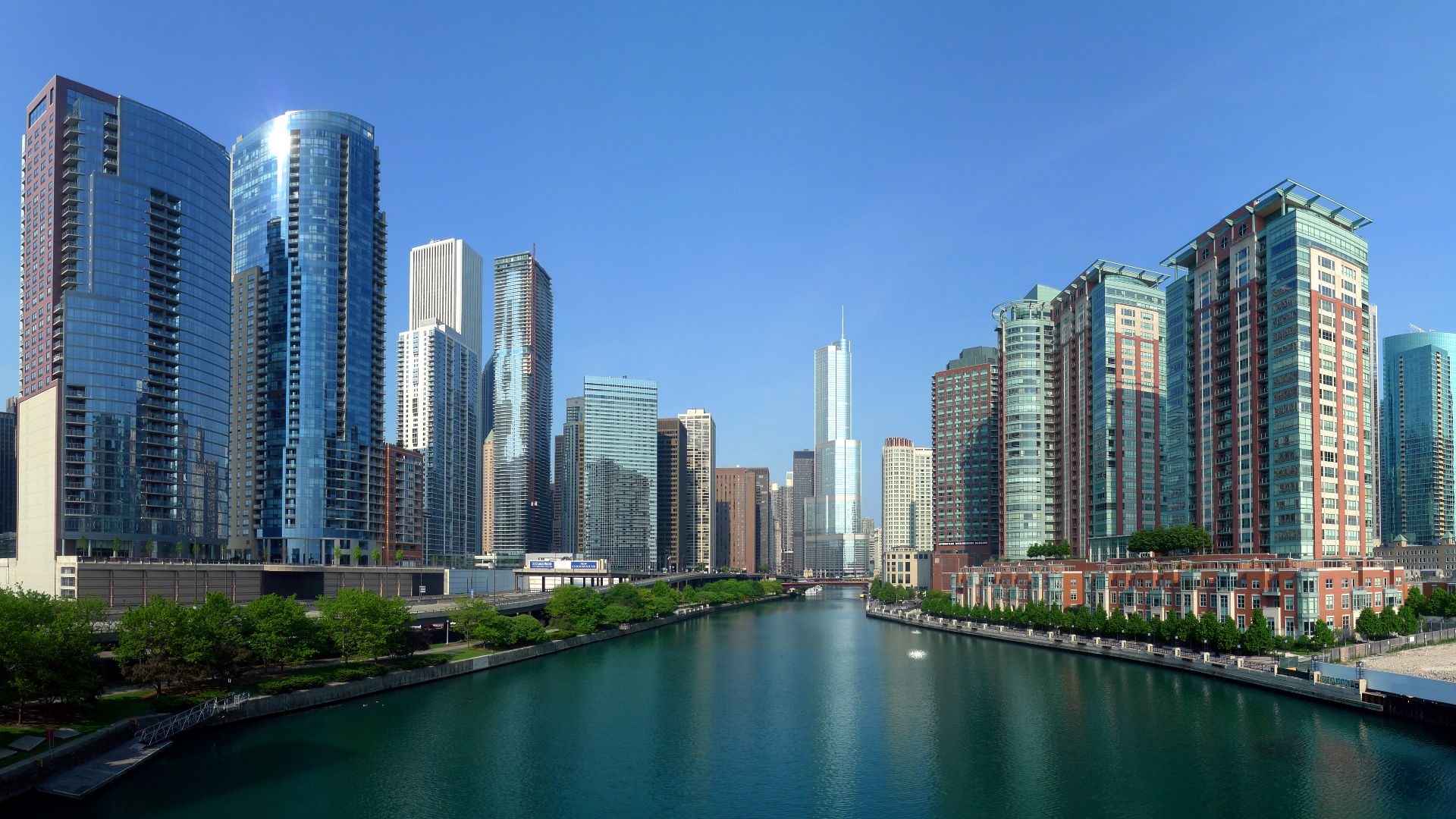 The Chicago River is the south border of the Near North Side and Streeterville and the north border of the New Eastside (viewed from Lake Shore Drive with Trump International Hotel and Tower at the jog in the river at the center.This 6-part composite pano