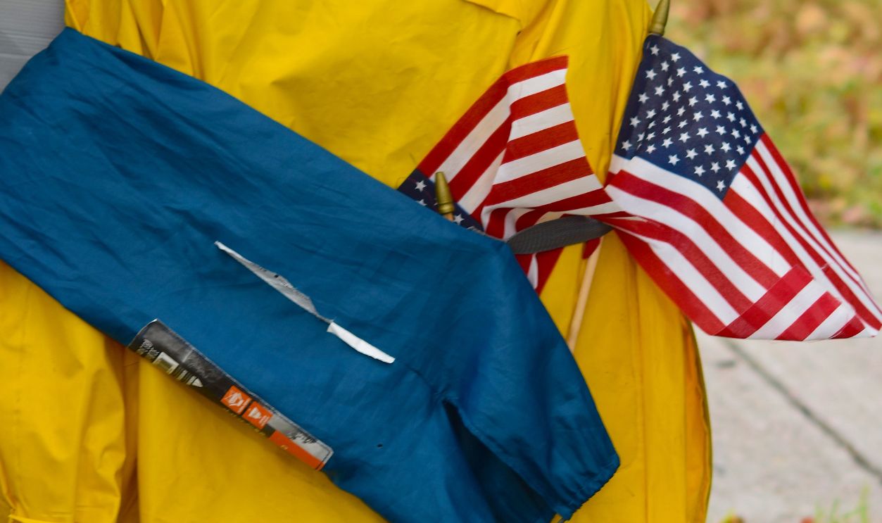 A protest setup with American flags outdoors
