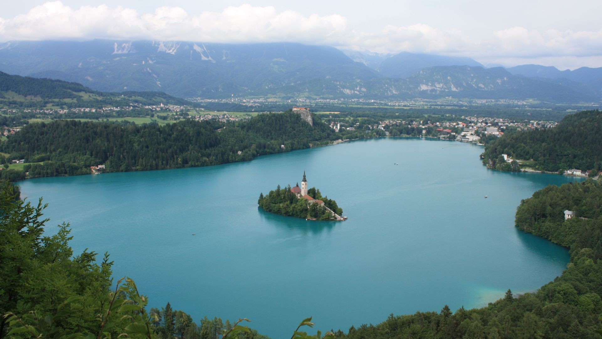 Overview of Lake Bled, island, castle and town in Slovenia.