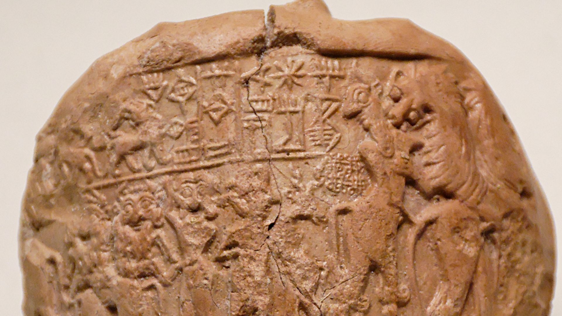 Clay bulla impressed with the seal of Lugalanda, one of the last kings of the Ist Dynasty of Lagash. Early Dynastic III (c. 2400 BC). Found in Telloh (ancient Girsu).