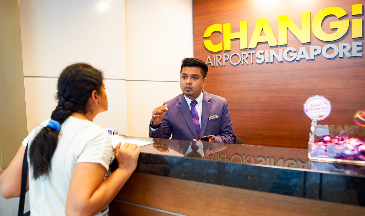 SINGAPORE - NOVEMBER 09, 2015: staff at Changi airport. Singapore Changi Airport, is the primary civilian airport for Singapore, and one of the largest transportation hubs in Southeast Asia