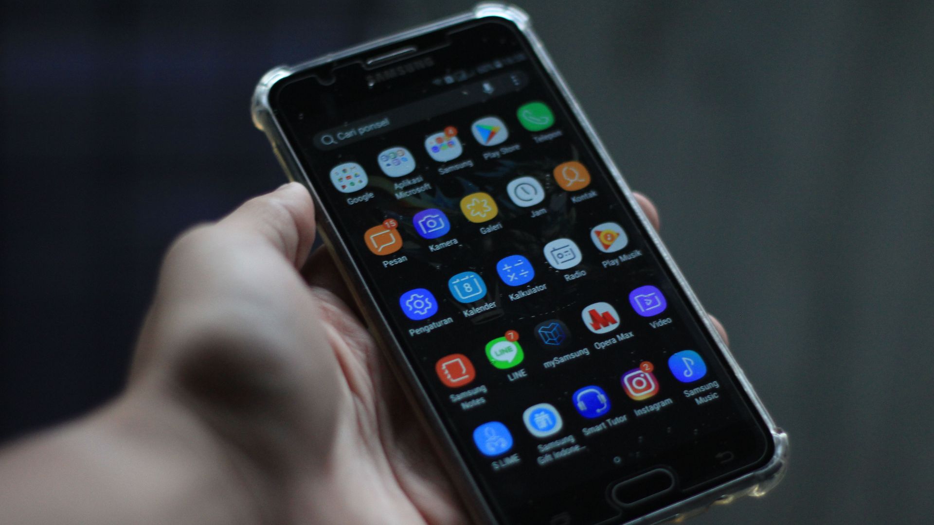 Close-up of a smartphone showcasing various mobile applications on its display.