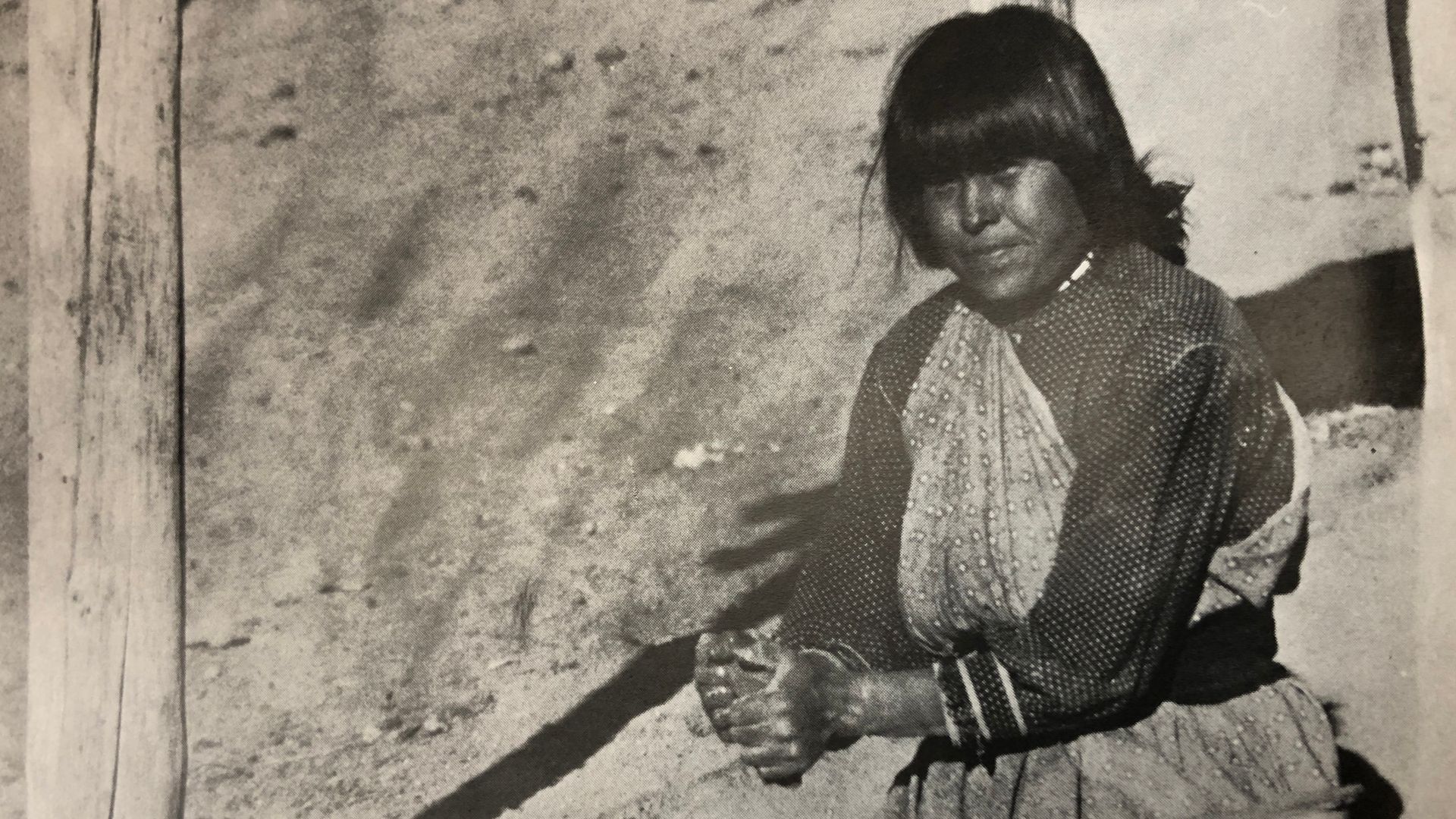 The San Ildefonso Pueblo potter, Maria Martinez in 1905, making pottery at her house.