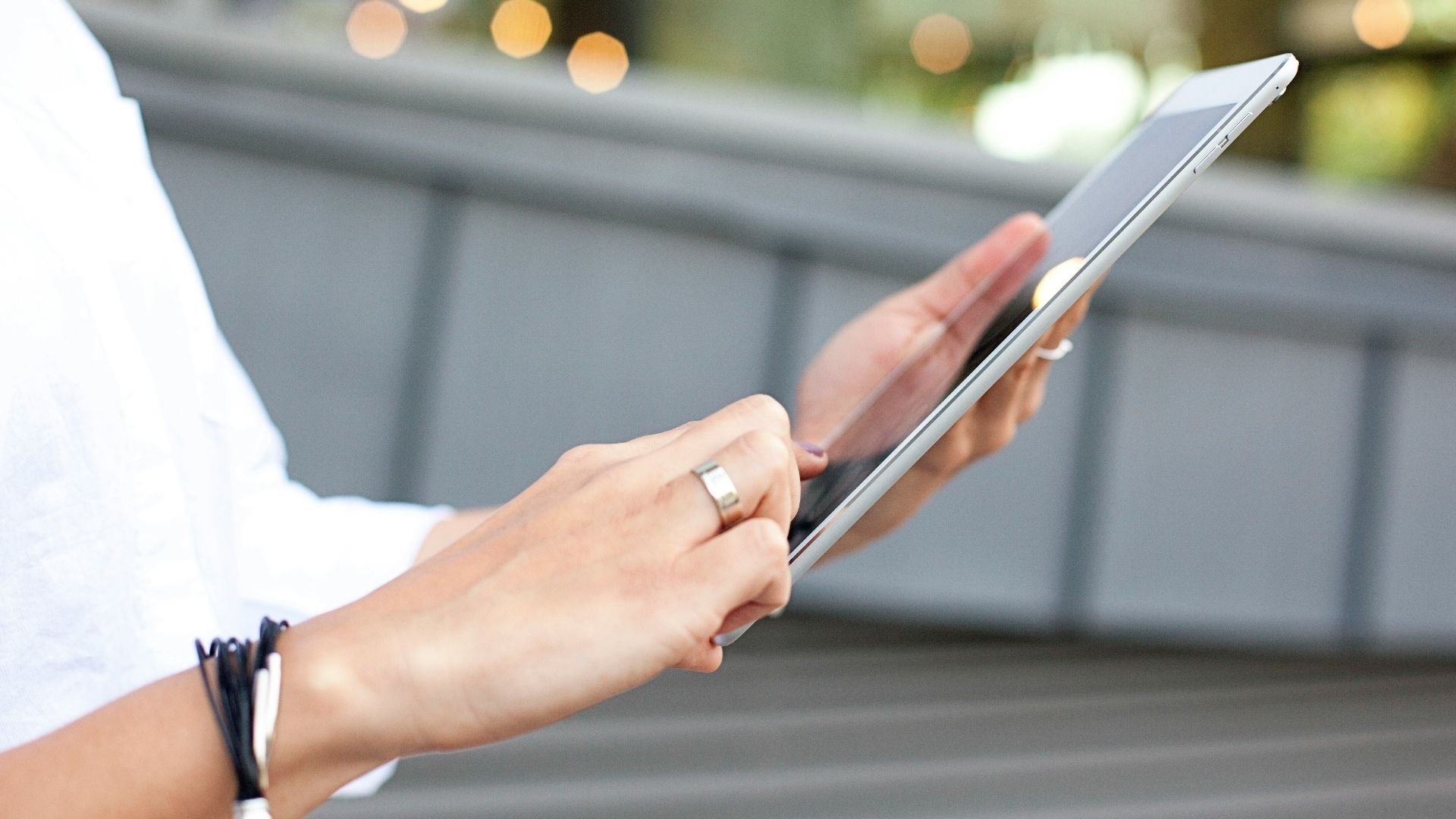 person holding iPad