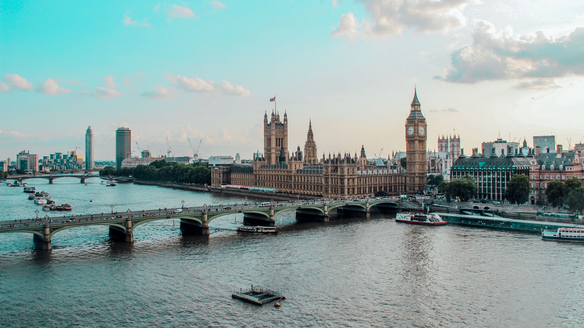 Captivating aerial view of Westminster Palace, Big Ben, and River Thames in London, UK.
