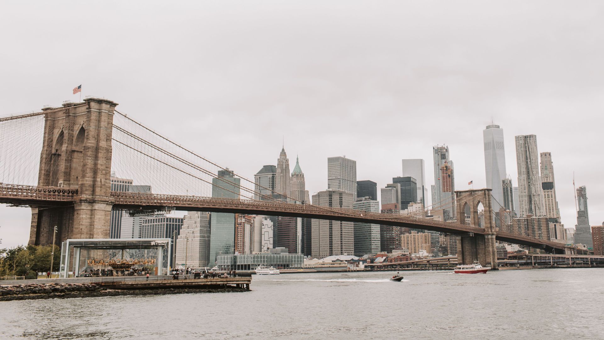Stunning view of the Brooklyn Bridge with New York City skyline in the background.