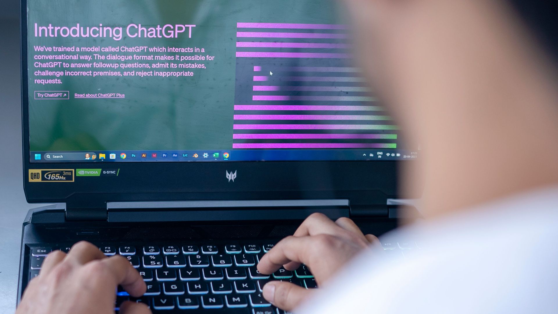 Focused shot of a man using ChatGPT on laptop. Ideal for tech-related content.