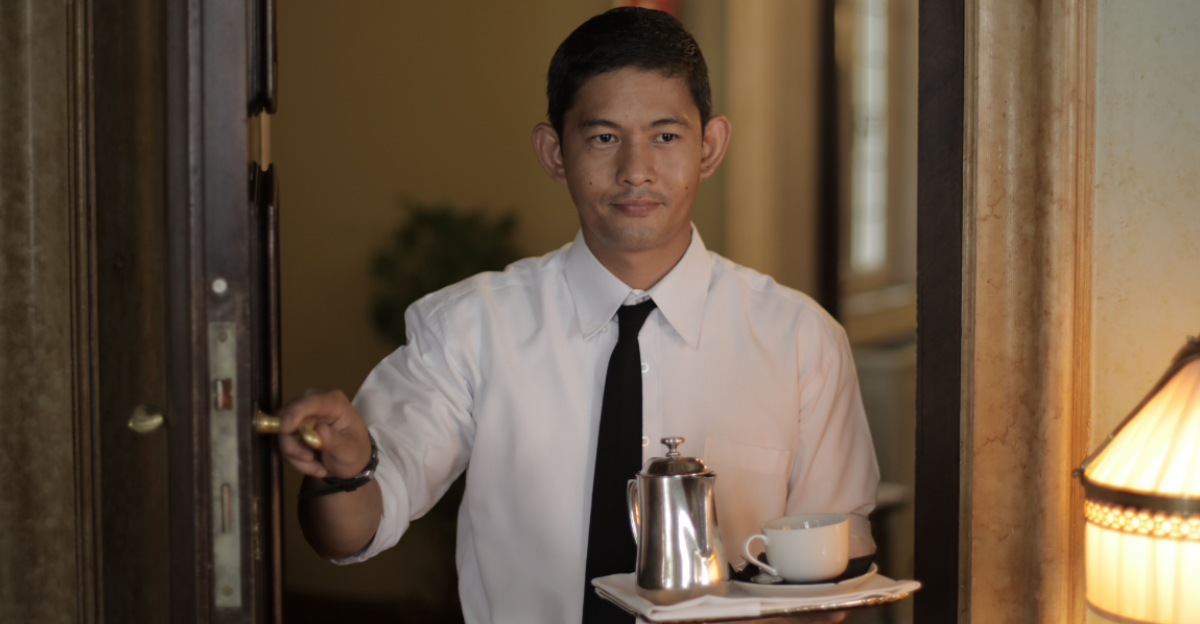 hotel-servant-carrying-coffee-to-guest