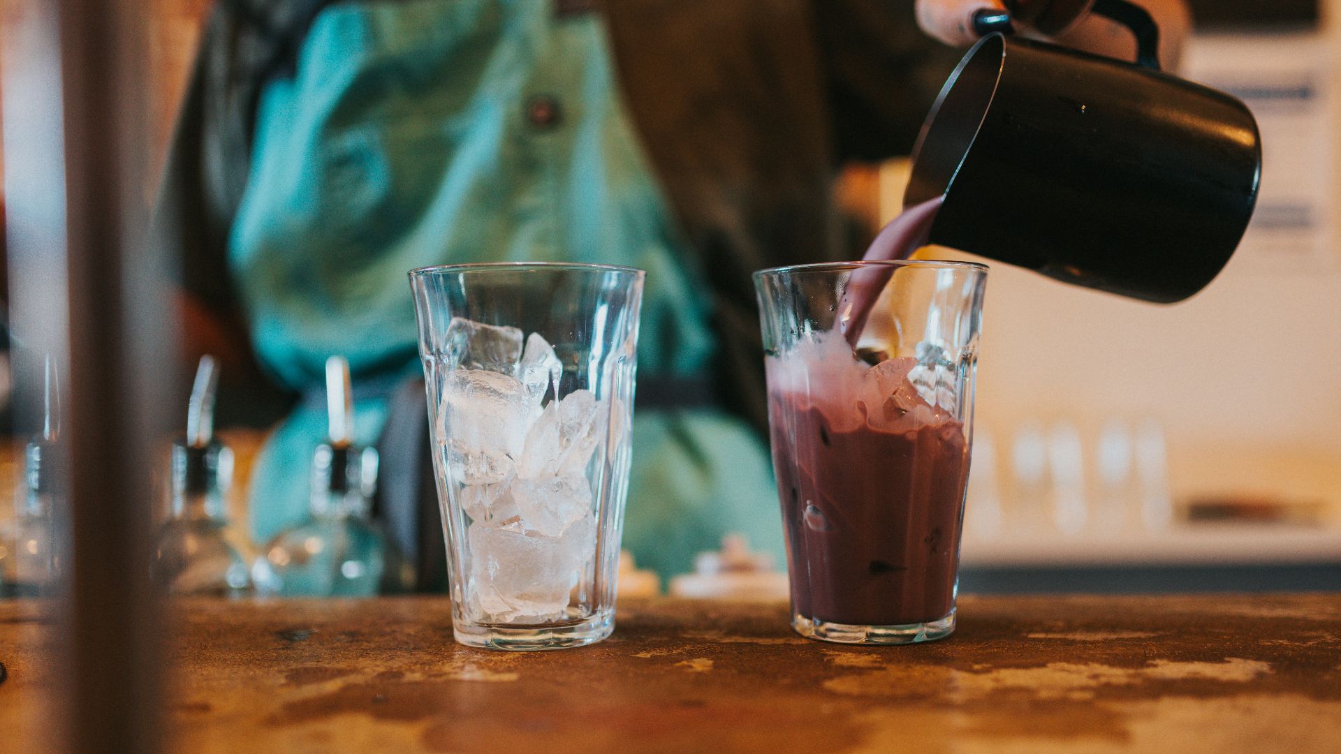 clear drinking glass with ice cubes