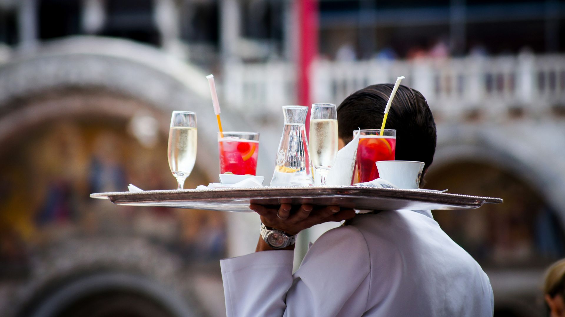 waiter serving beverages