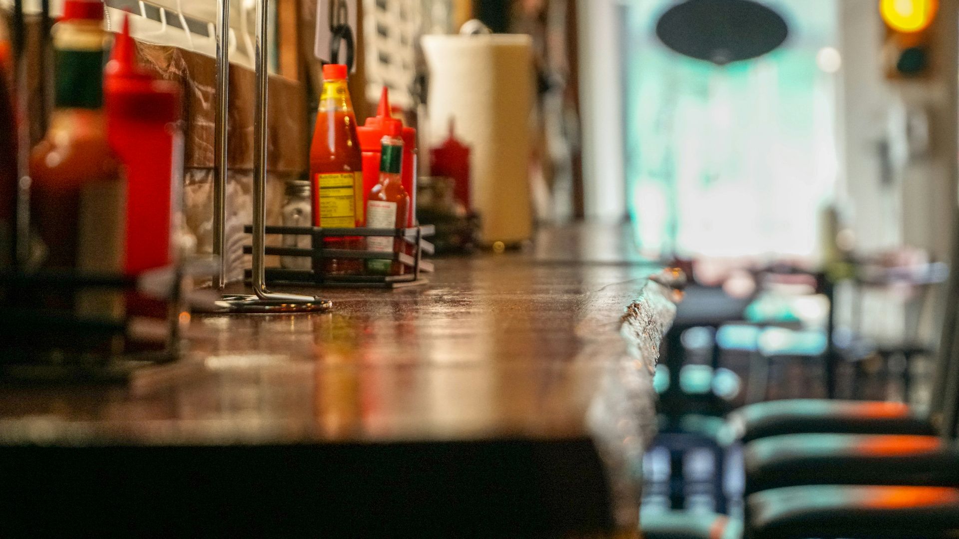 selective focus photography of bottles on table
