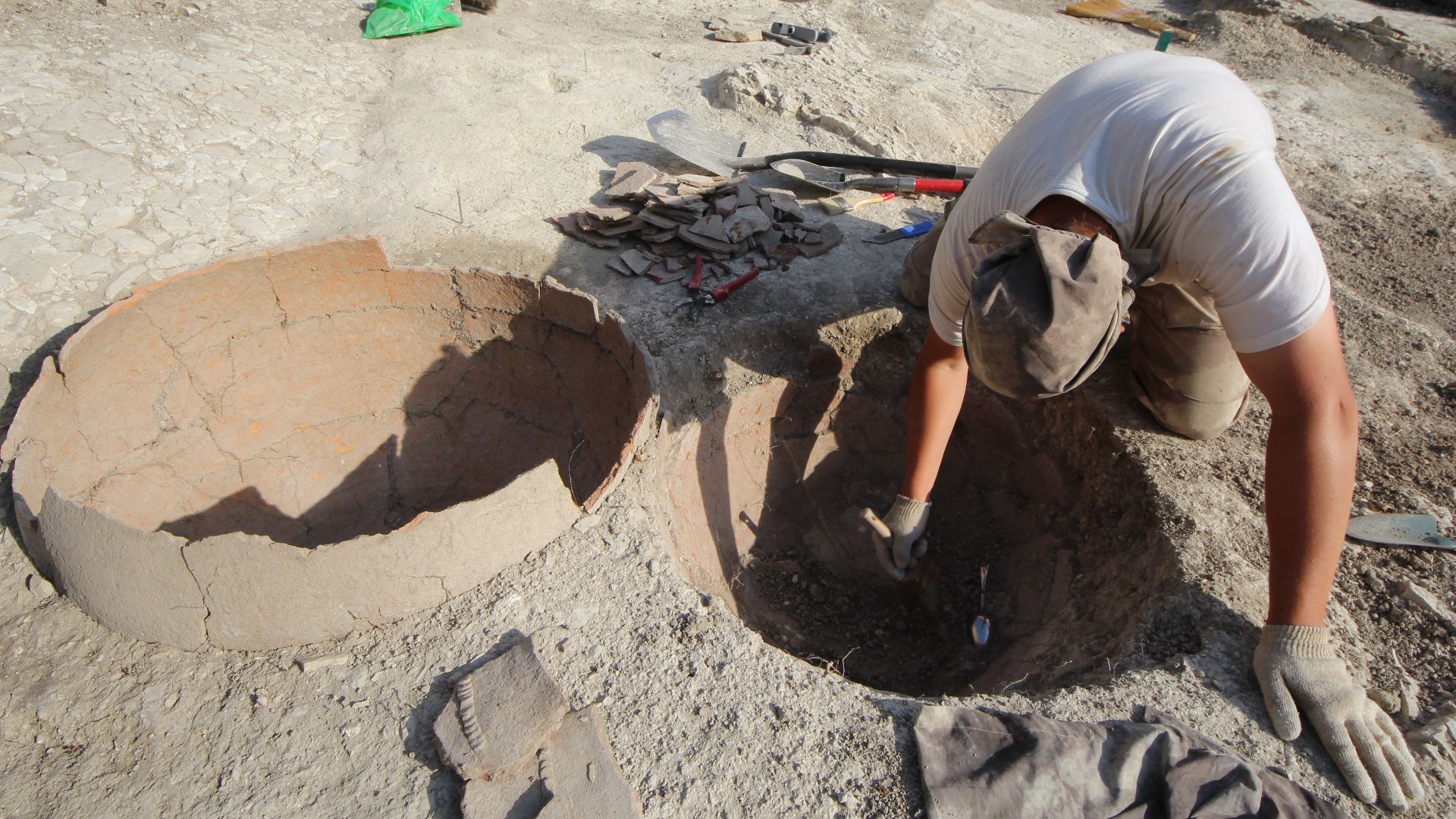 Archaeological field work, cleaning the findings