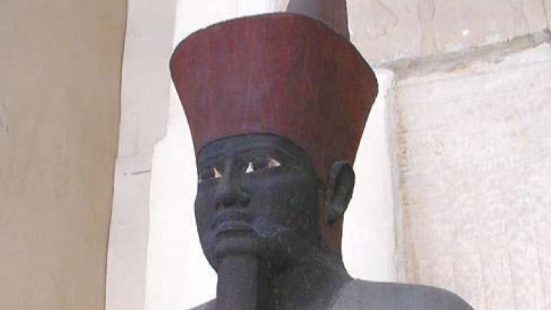 Seated statue of Nebhepetre Mentuhotep II, in the Egyptian Museum, Cairo. Painted Sandstone, 11th Dynasty.

Egyptian Museum, Cairo. Main floor - gallery 26. Sandstone: height 138 cm, width 47 cm. JE 36195.