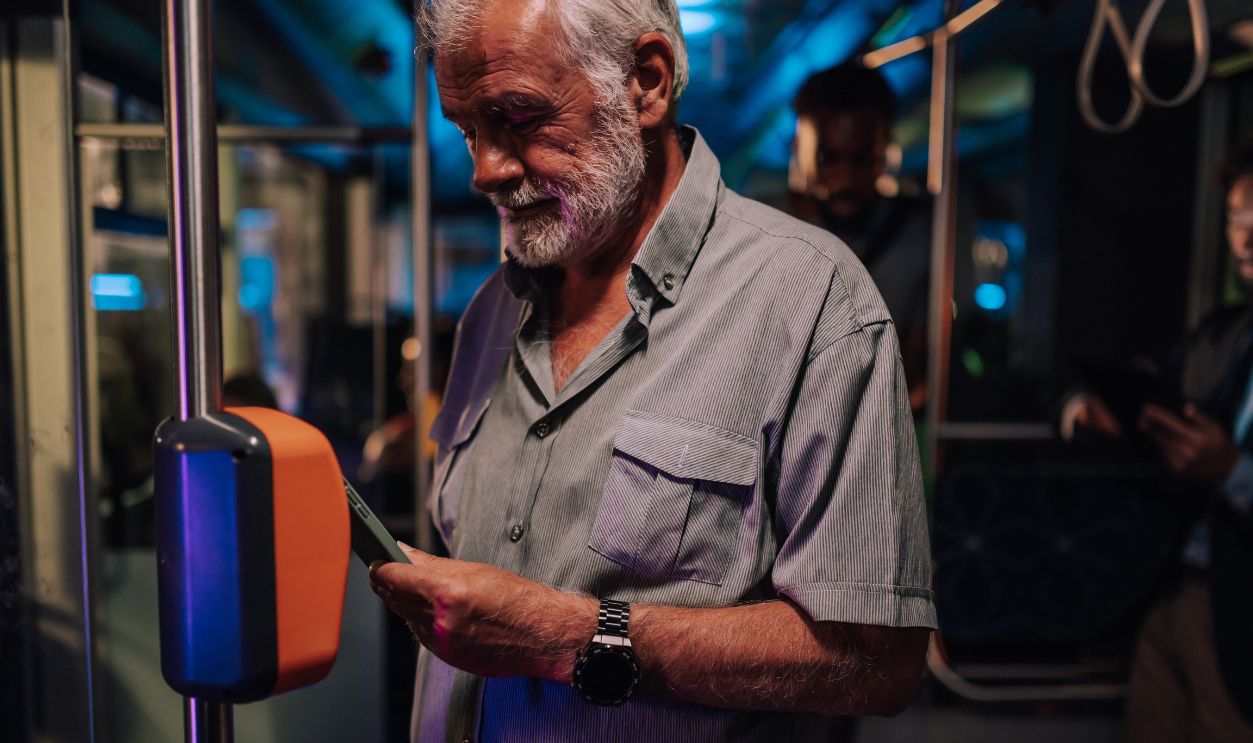 elderly paying for bus fare 