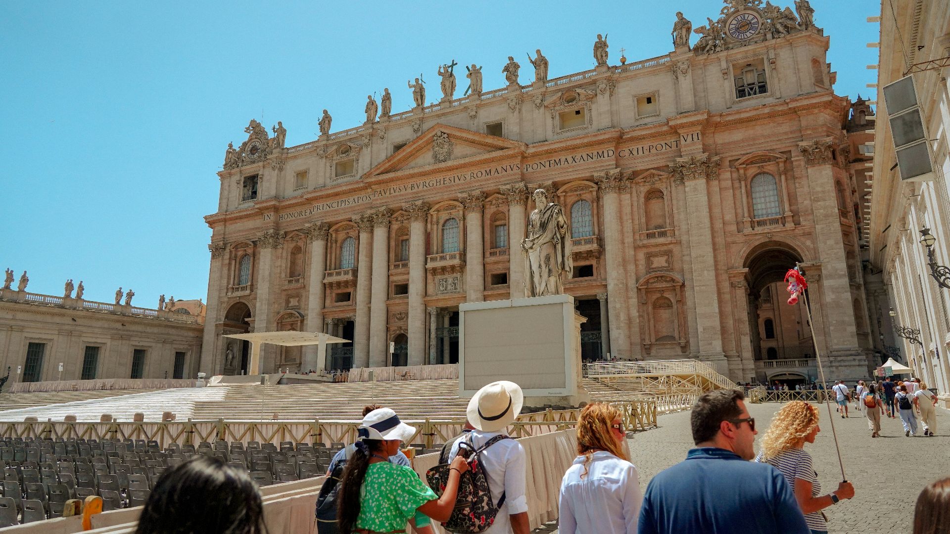 a group of people standing in front of a building