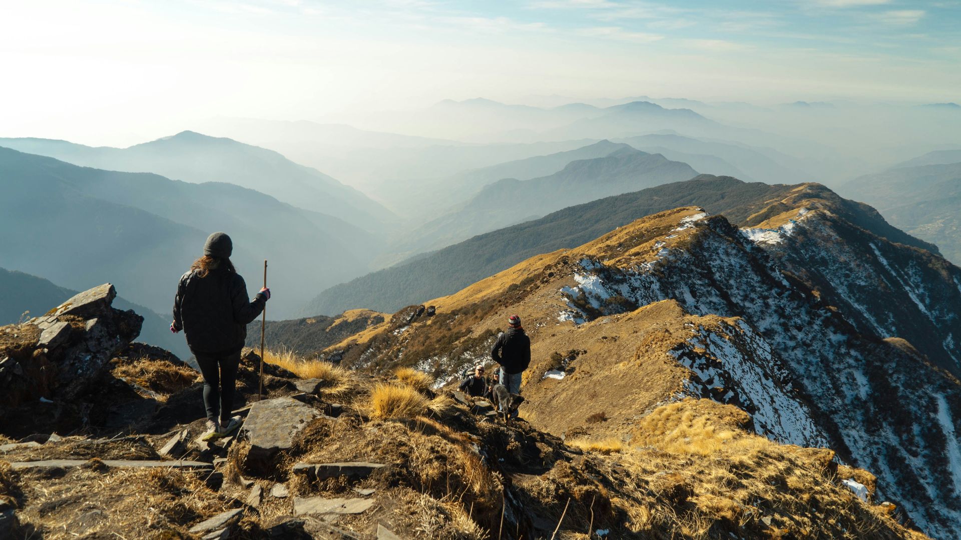 person on top of mountain during daytime