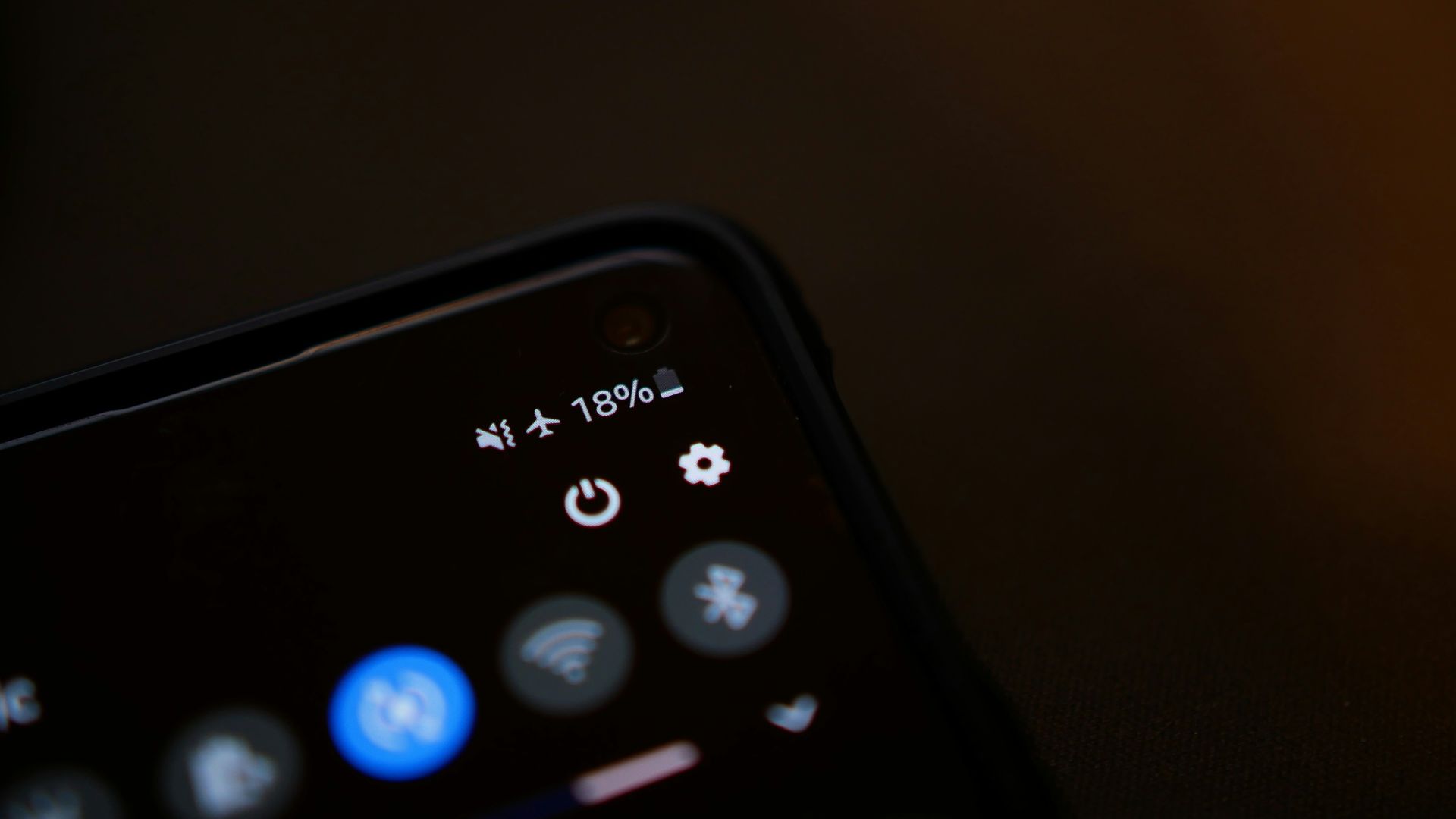 black remote control on white surface