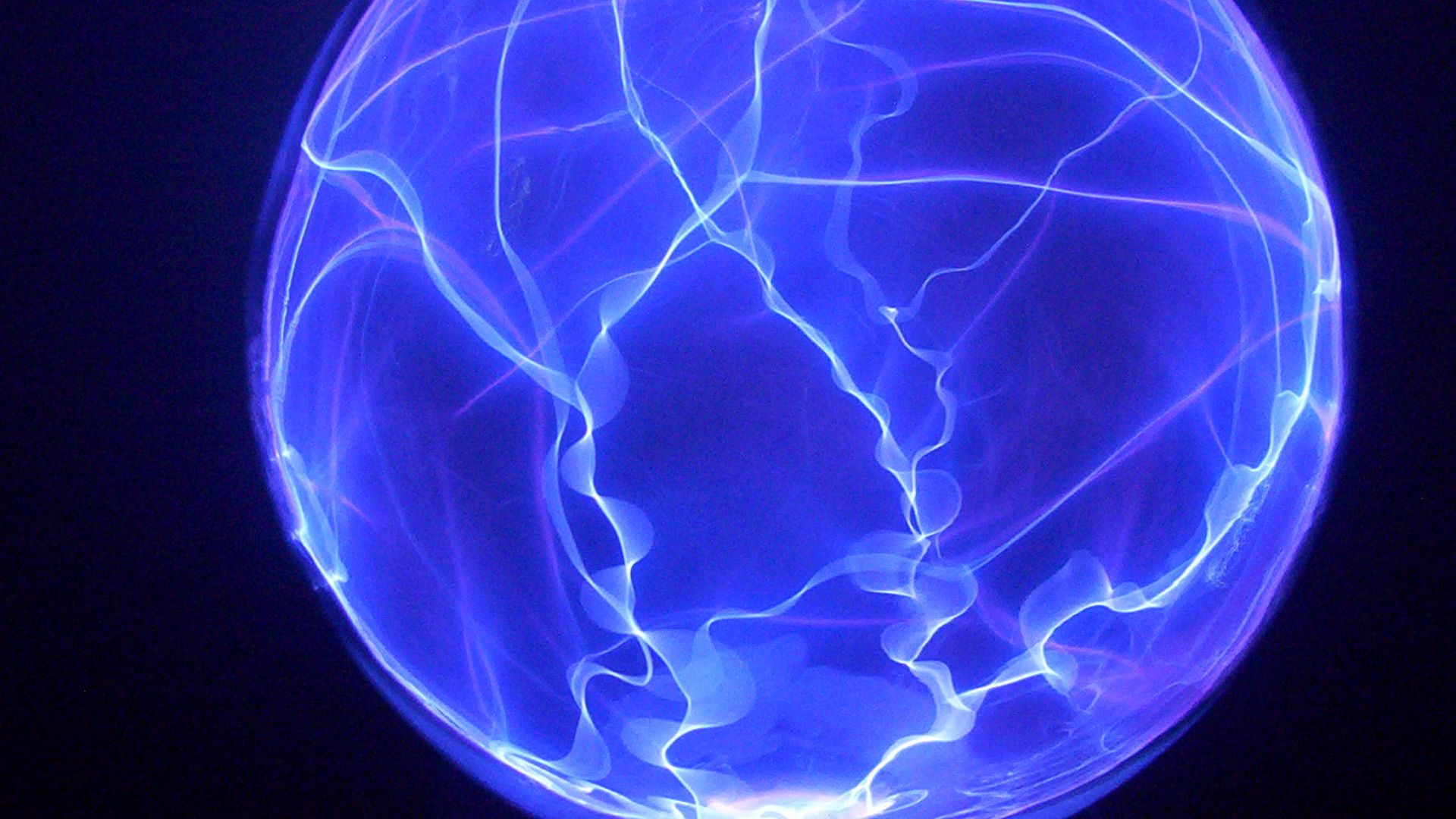 I took the picture of my own plasma globe this is a cauldron plasma globe with a wonderful swirling display that's very active in nature. this is a professional quality pyrex globe.