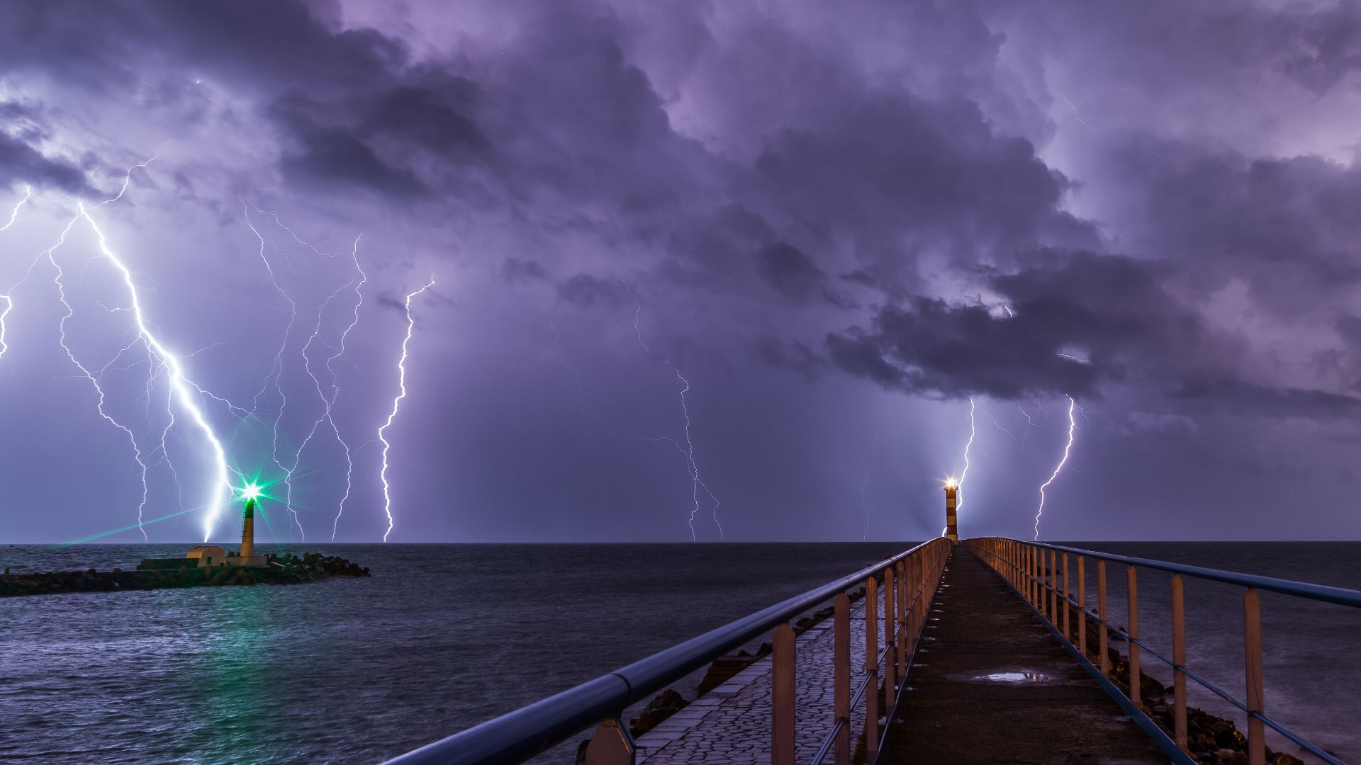 Lightning during an overnight storm at the port and lighthouse in Port-la-Nouvelle in the Aude department in southern France.