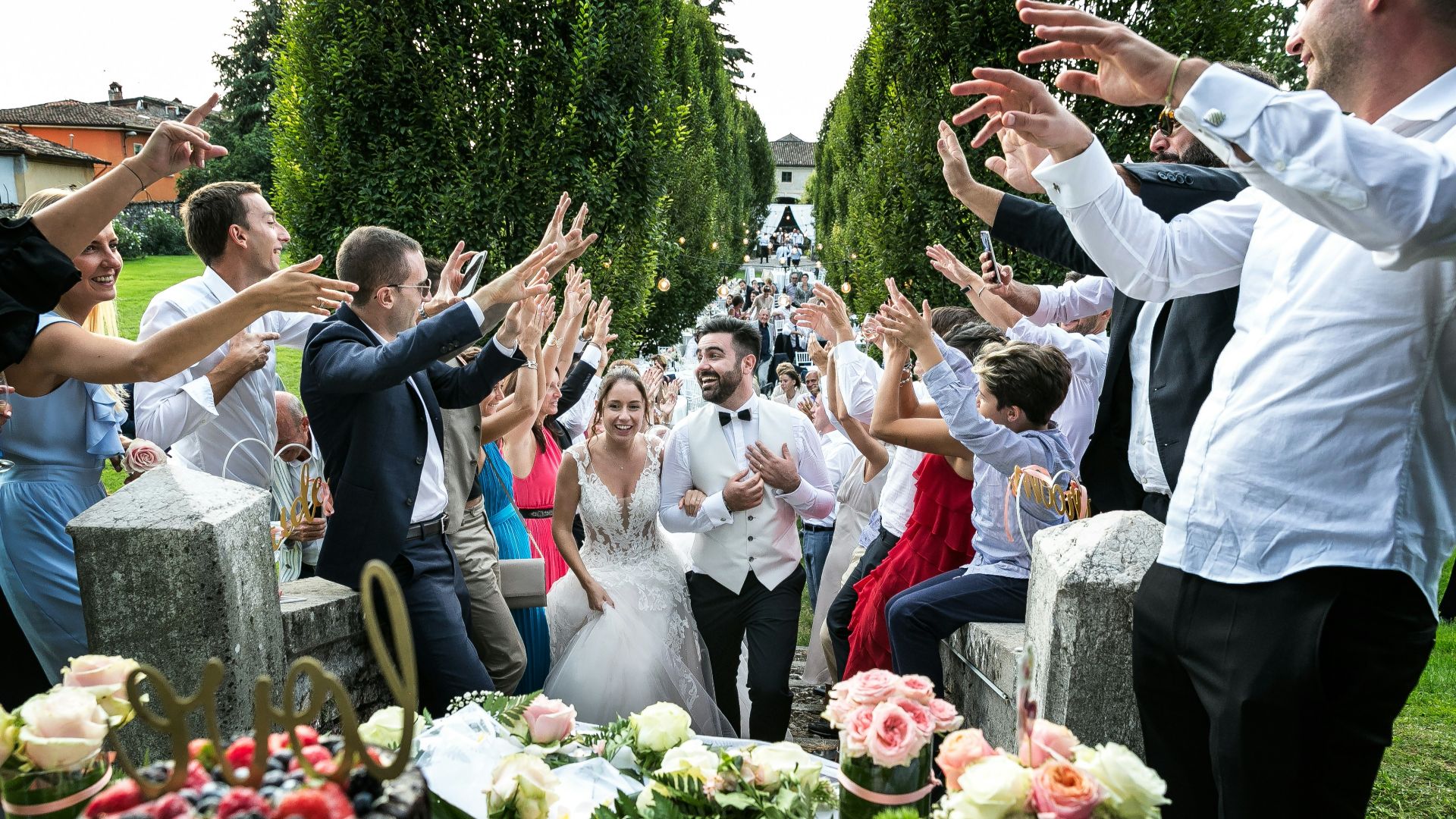 people standing and sitting on chair during daytime