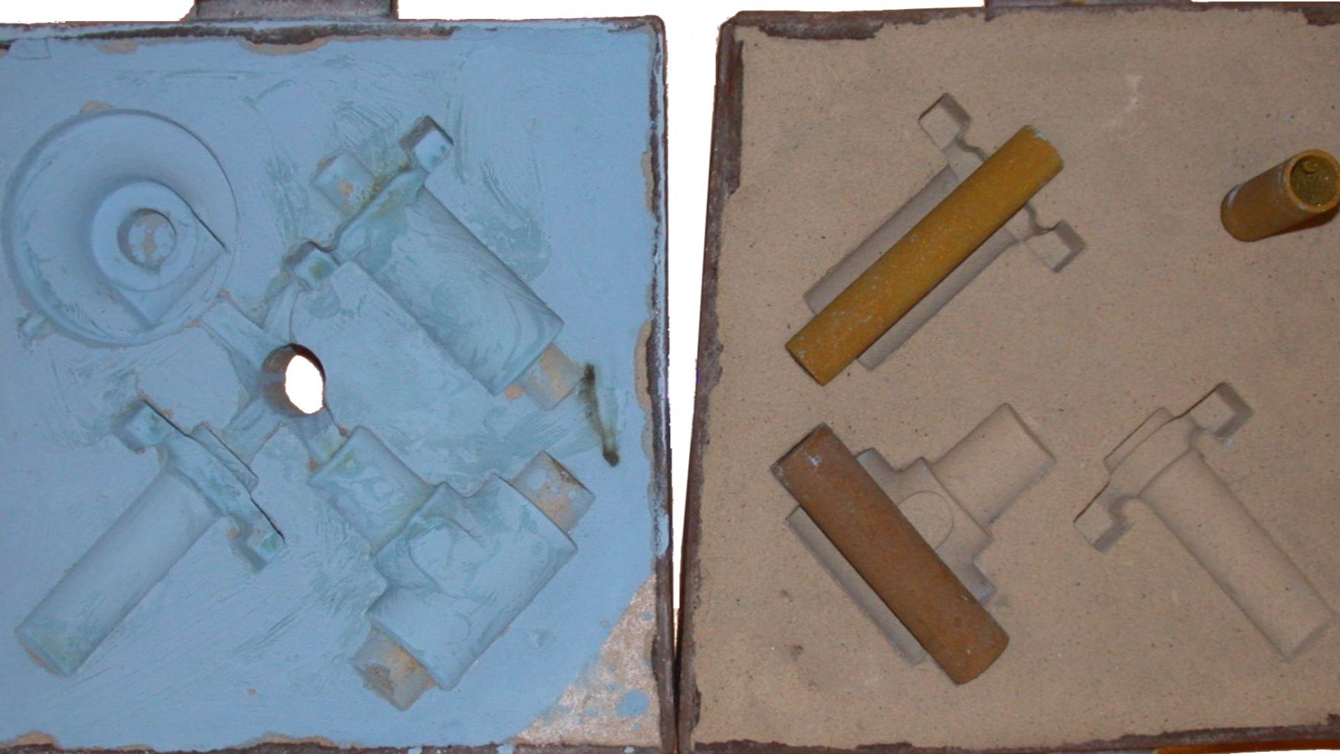 Cope & drag (top and bottom halves of a sand mold), with cores in place on the drag. Results: File:SandMoldBronzeAluminium.jpg