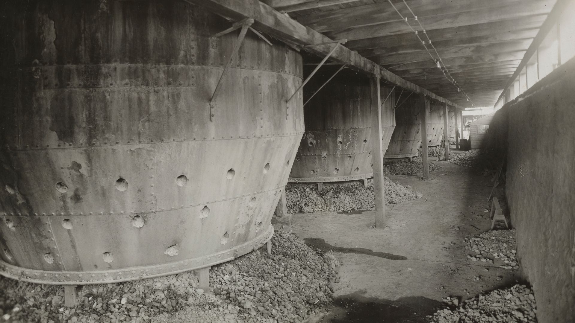 Scope and content:  Original Caption:  Iron ore and pig iron production plant of Robesonia Iron Company, Philadelphia Pennsylvania.  Lower part of the Roasters showing ore after surplus has been removed and ready for charging into the furnace.