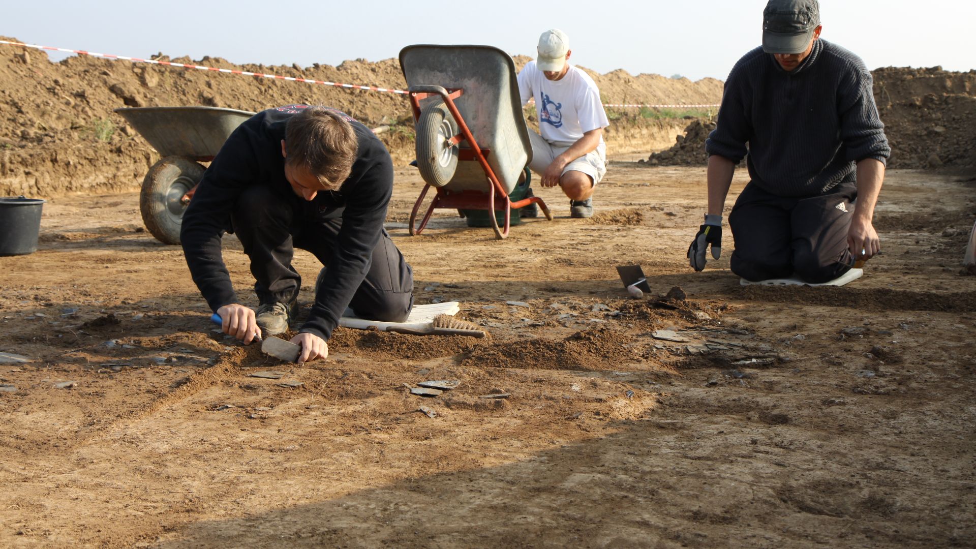 Students from the University of Mainz take part in an archeological dig for Roman artifacts and ruins Sept. 22, 2009, during foundation work at a new townhouse project site at the southern end of the Wiesbaden Army Airfield in Germany. The excavation effo