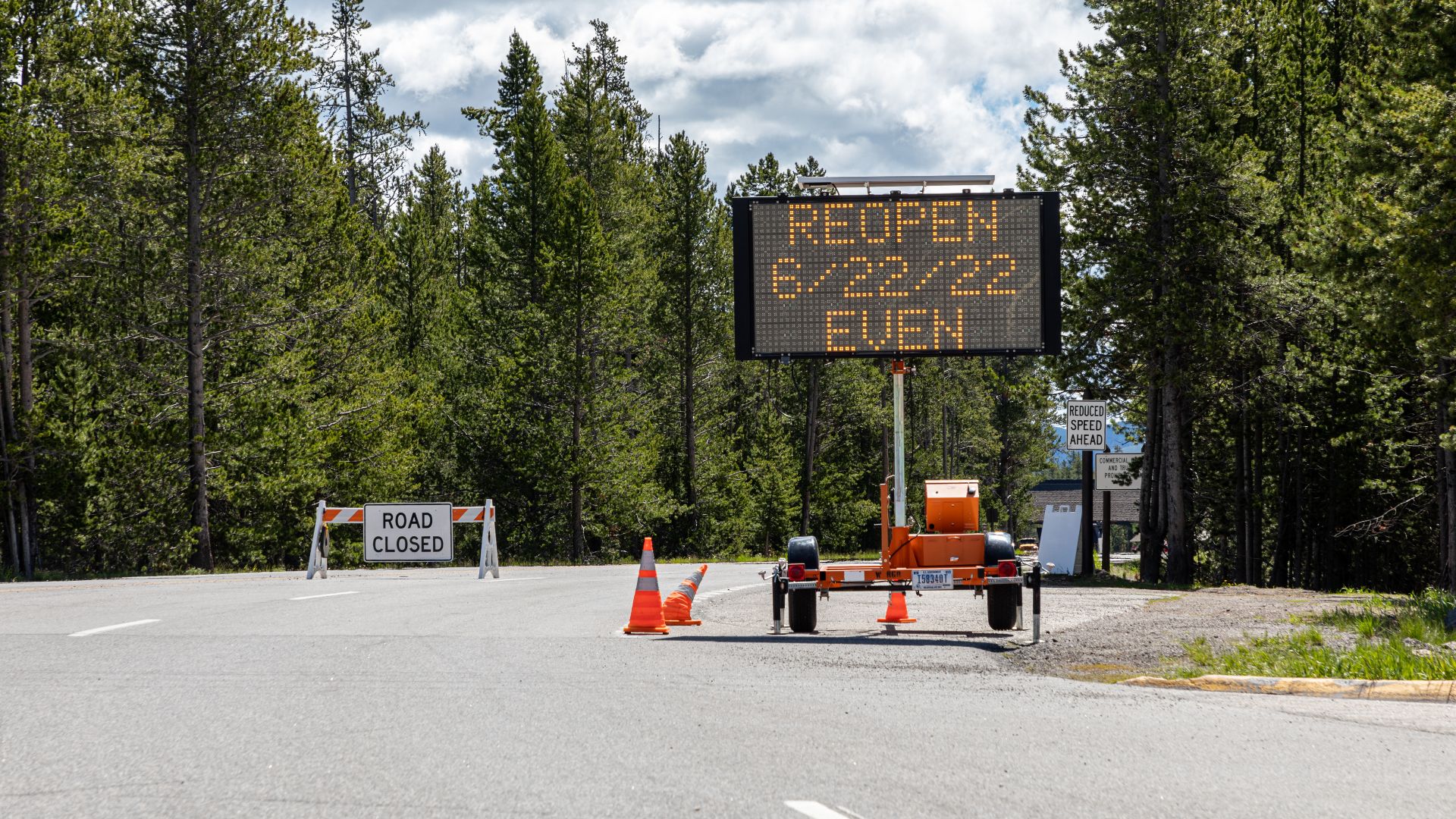 Closed west entrance of Yellowstone National Park (after the heavy rains in June 2022; reopening on June 22, 2022 for vehicles with even final digit) in West Yellowstone, Montana, USAYellowstone National Park was founded on March 1, 1872, and is considere