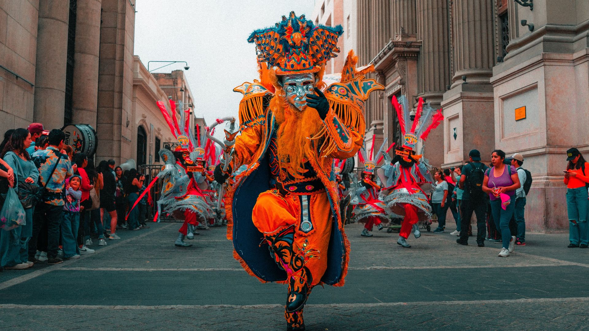 Colorful traditional parade in Lima showcasing Peruvian culture and vibrant costumes.
