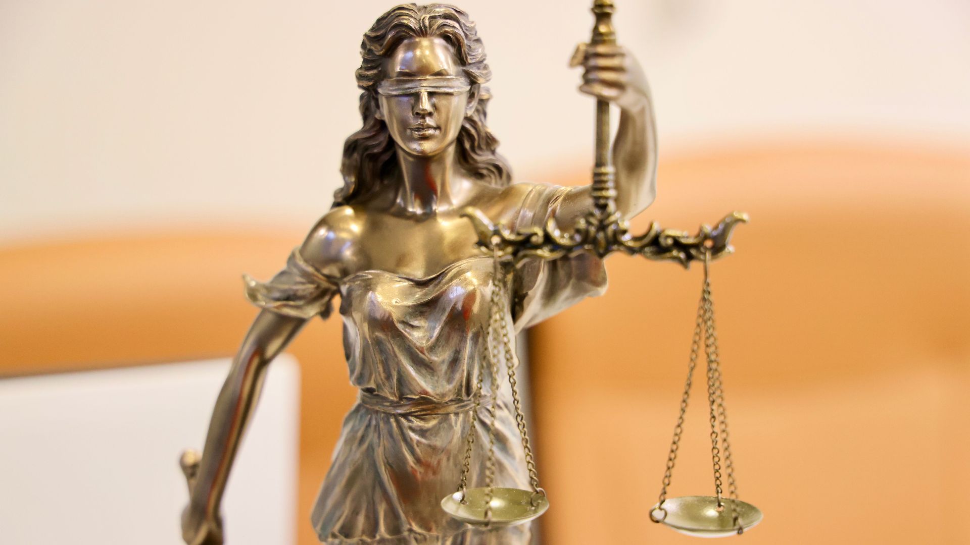 Detailed image of Lady Justice statue, symbolizing fairness and impartiality.