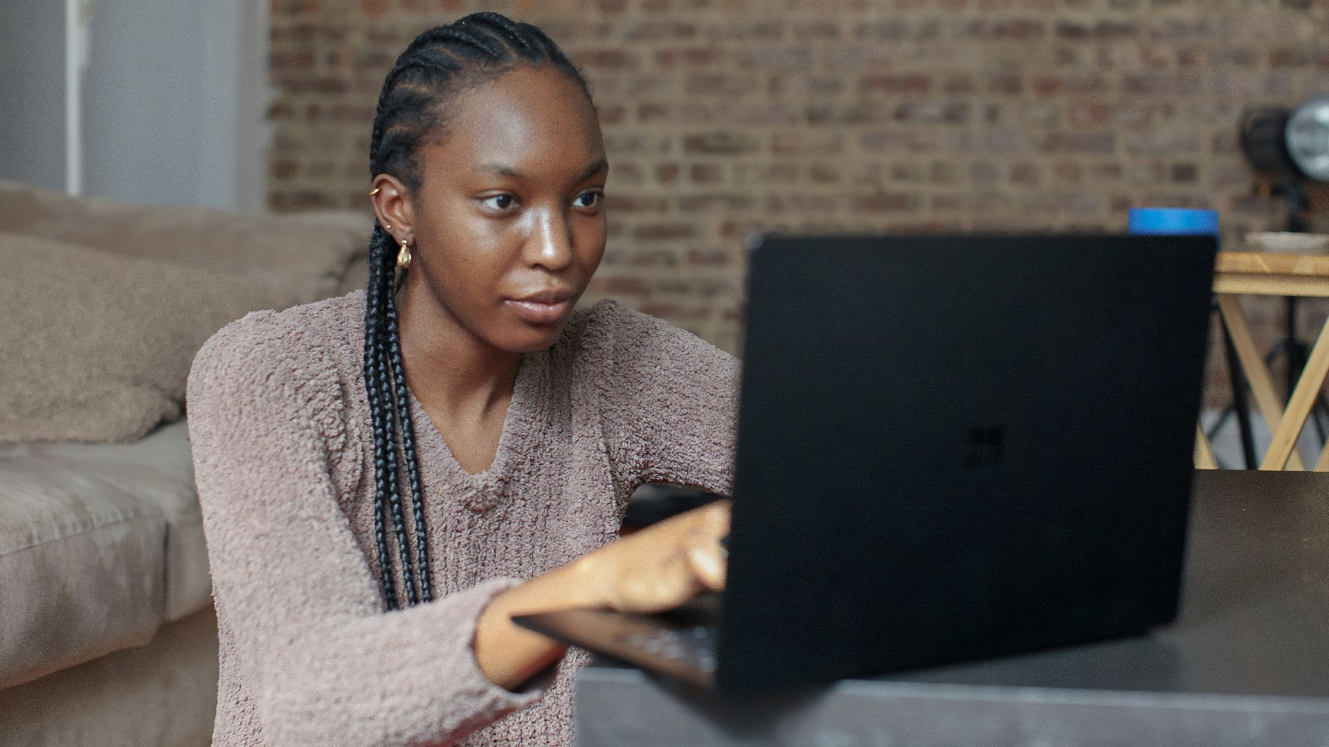 person using black Surface device