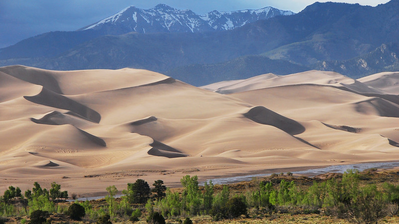 Medano Creek, Dunes, and Cleaveland Peak at the Great Sand Dunes National Park, Colorado, United States