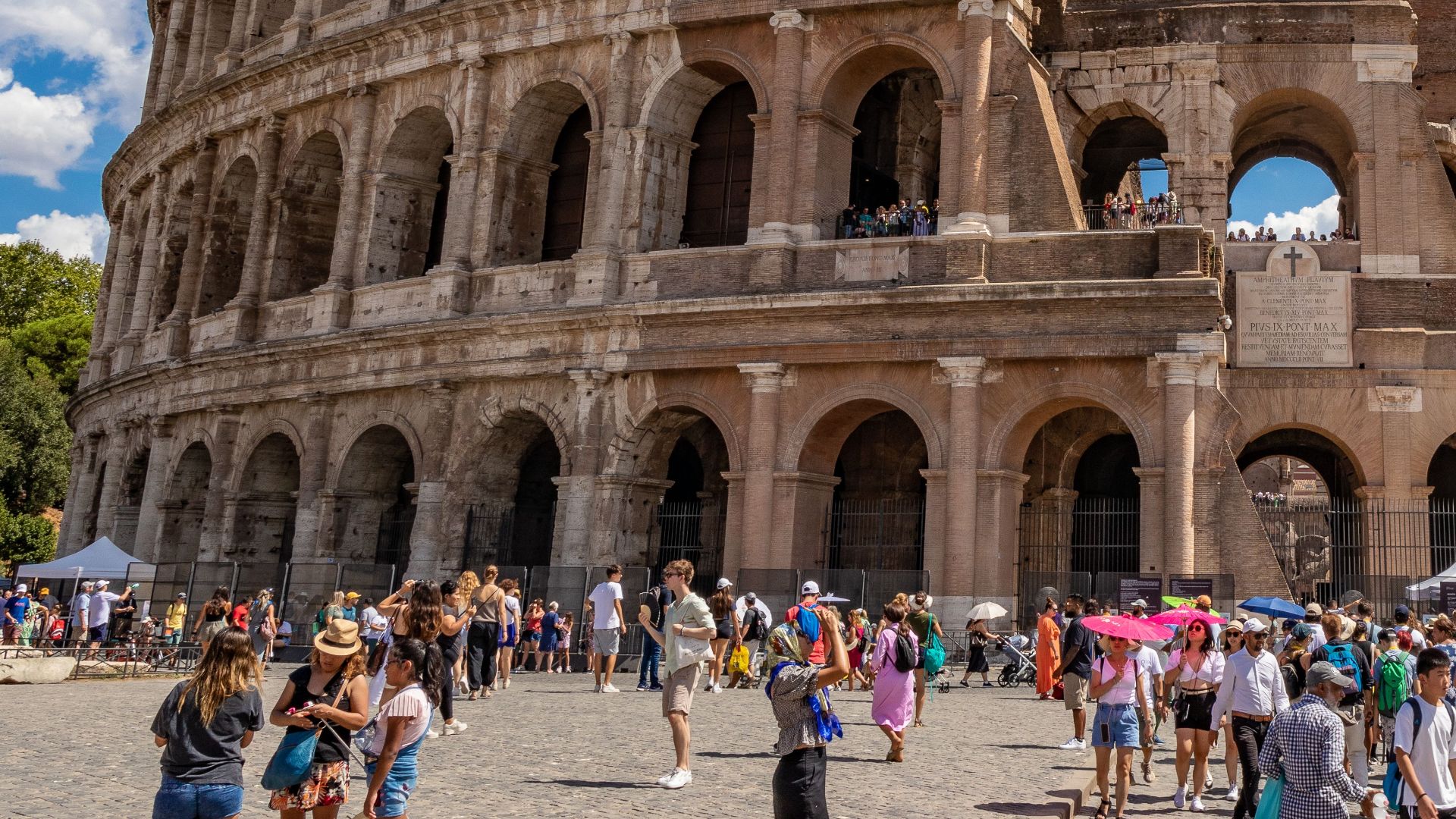 Explore the ancient Colosseum in Rome, a stunning architectural marvel attracting many tourists.