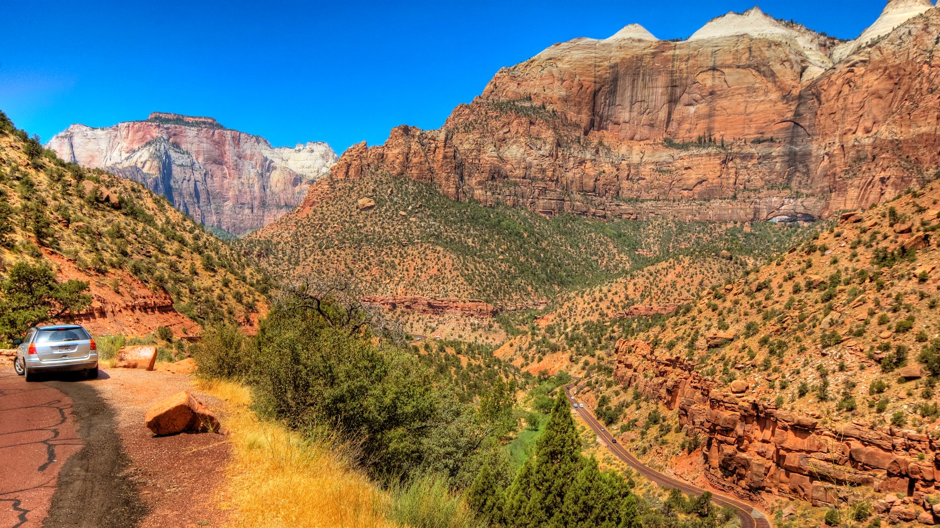 Zion National Park is a United States National Park located in the Southwestern United States, near Springdale, Utah. A prominent feature of the 229-square-mile (593 km²) park is Zion Canyon, 15 miles (24 km) long and up to half a mile (800 m) deep, cut t
