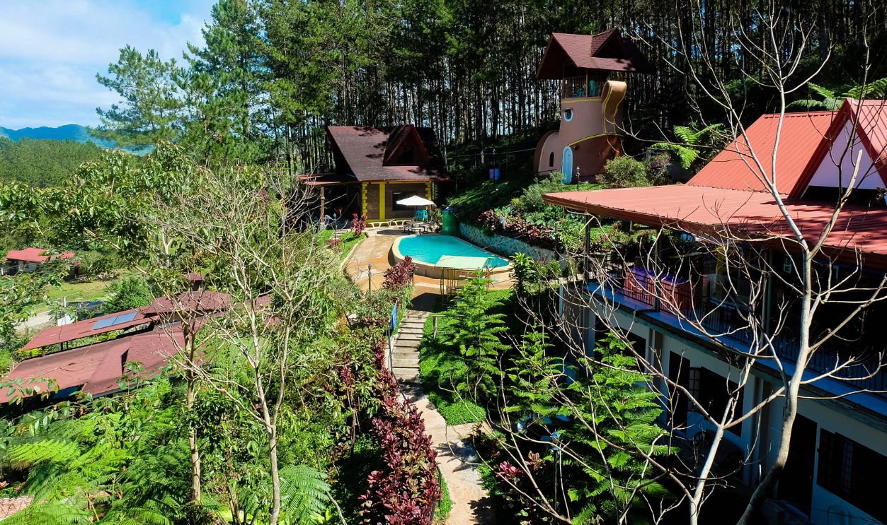 Picturesque resort with pool surrounded by lush greenery in Arakan, SOCCSKSARGEN, Philippines