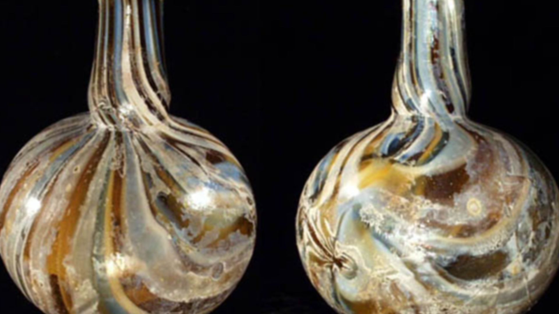 Roman marbled glass piriform unguentarium