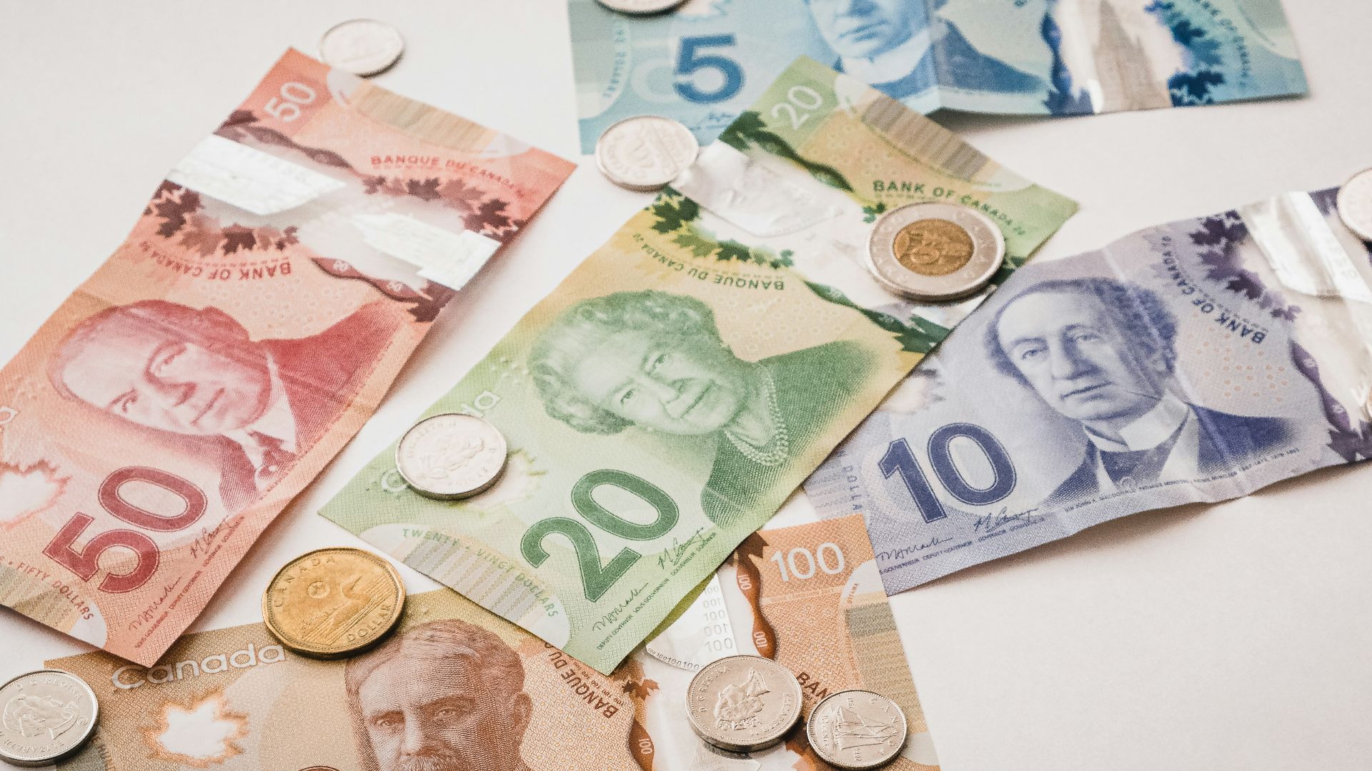 a bunch of money sitting on top of a table
