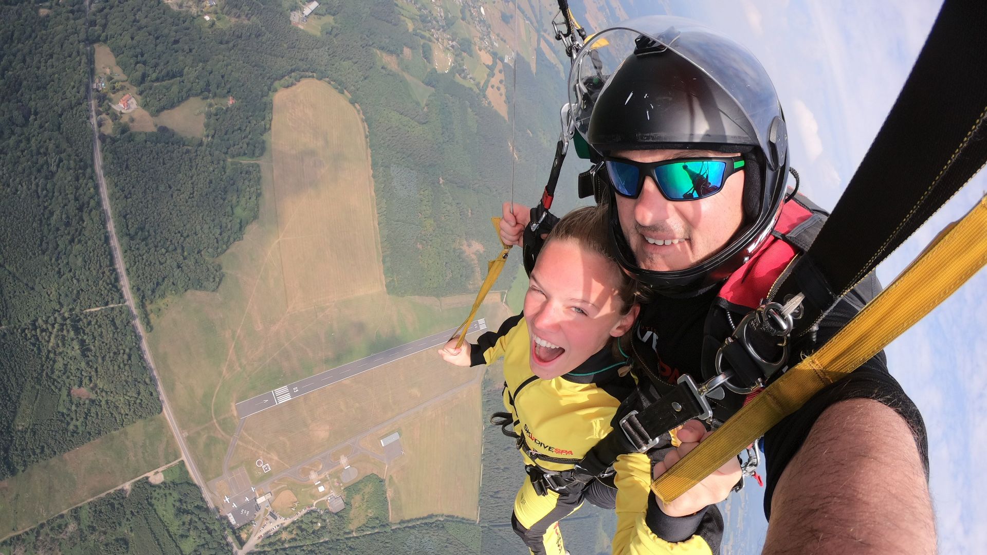 Experience the thrill of tandem skydiving with breathtaking views of Spa, Belgium.