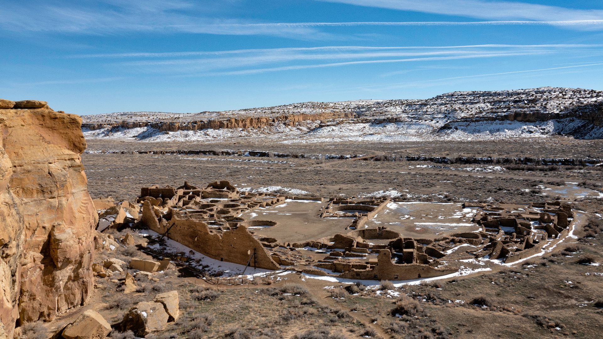 I drove out to Chaco Canyon a couple of days after they got a good snow. But the snow had mostly melted. Plenty of mud, though. I took this shot from the trail that leads up to Pueblo Alto. There's a marvelous view at the top; you can see for miles in all