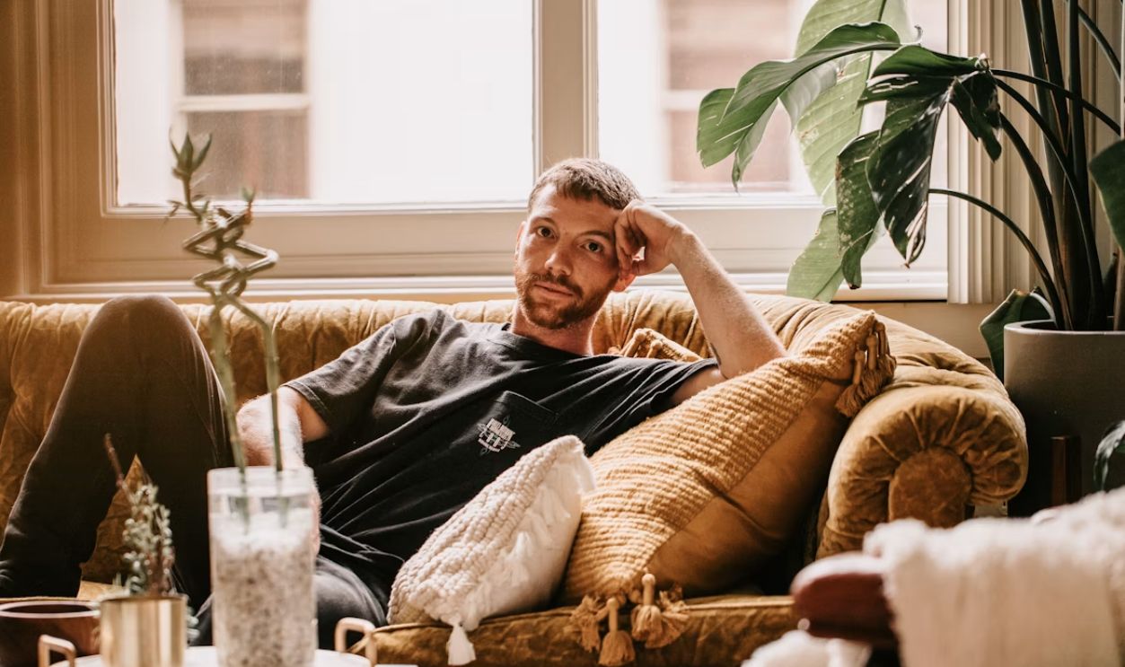 man relaxing on the couch 