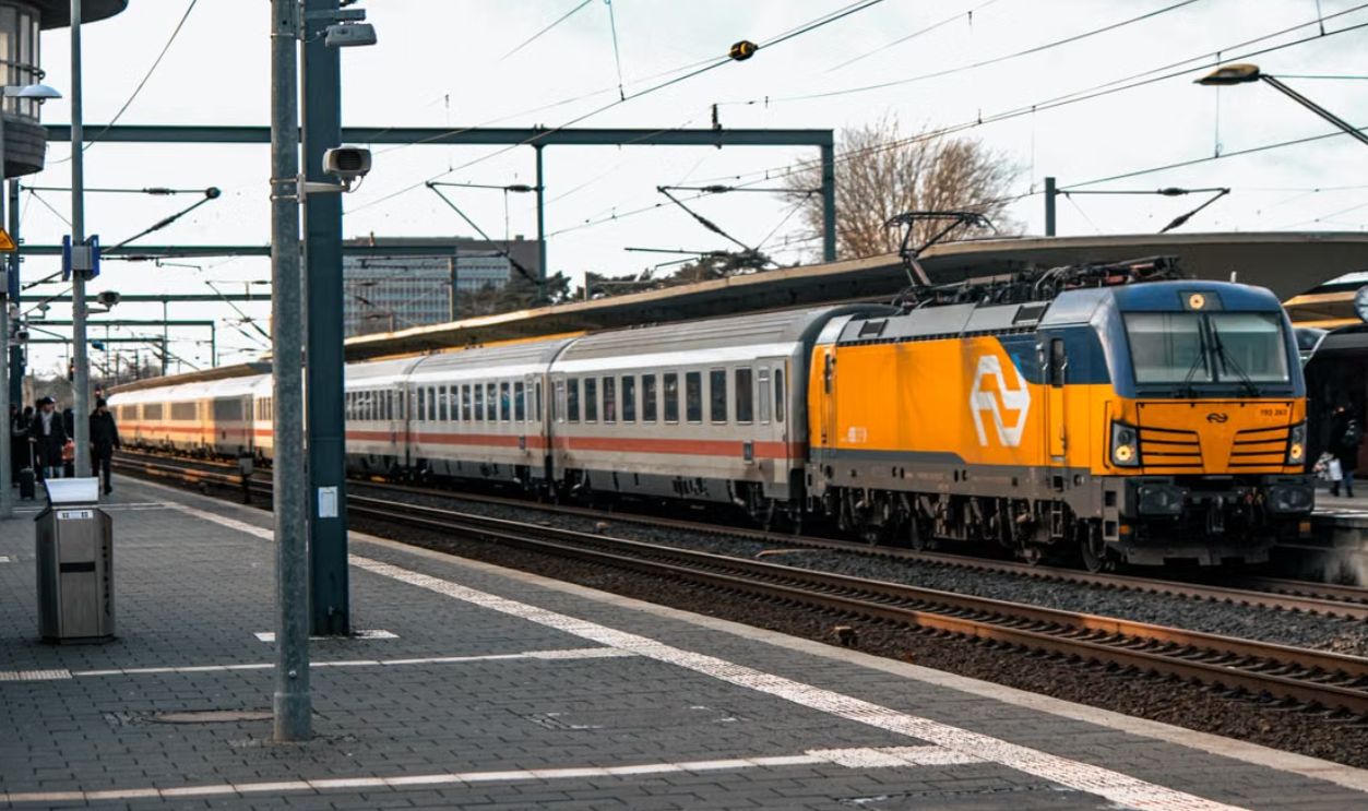 Modern locomotive at Wolfsburg station showcasing transport and travel