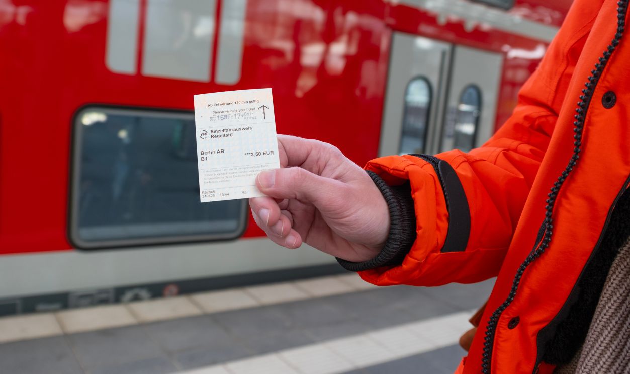 male passenger with Deutsche Bahn ticket, public transportation, travel efficiency, modern transit systems, Berlin, Germany - 24 April, 2024