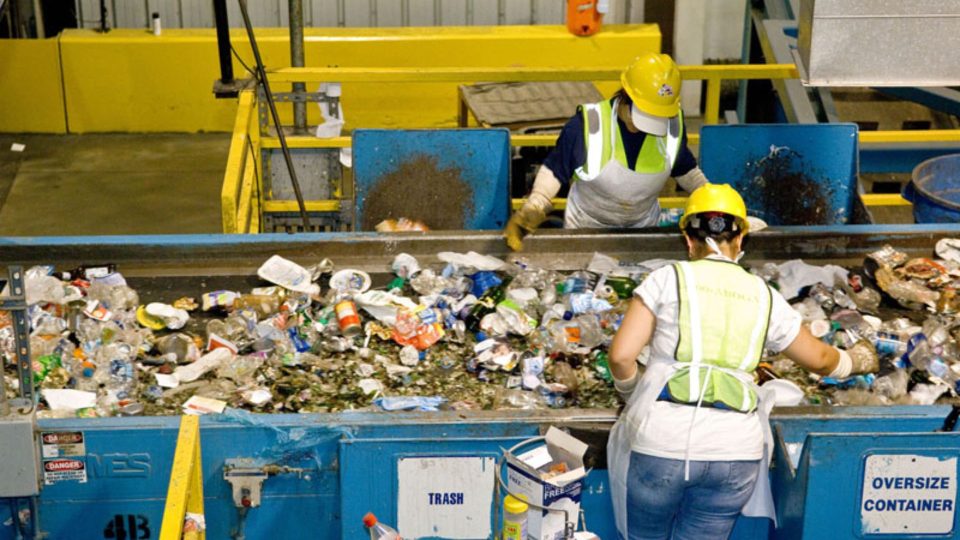Workers in the Recycling Center (Materials Recovery Facility) at the Shady Grove Transfer Station‎, Montgomery County, Maryland