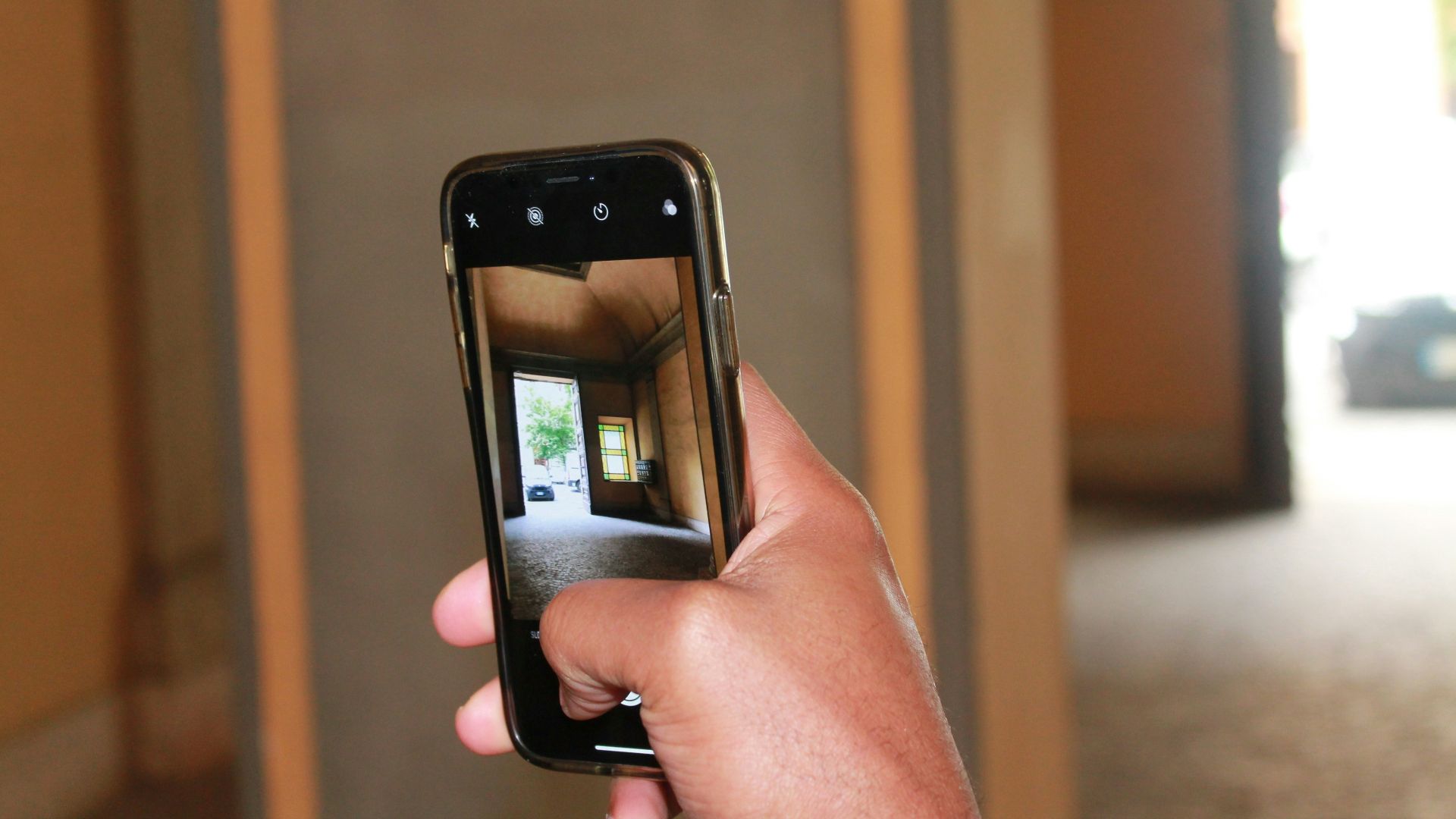 person holding black smartphone