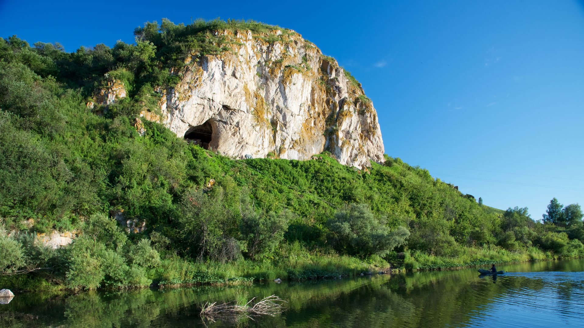 View of the Neanderthal site Chagyrskaya cave, Alta Mountains, Russia.