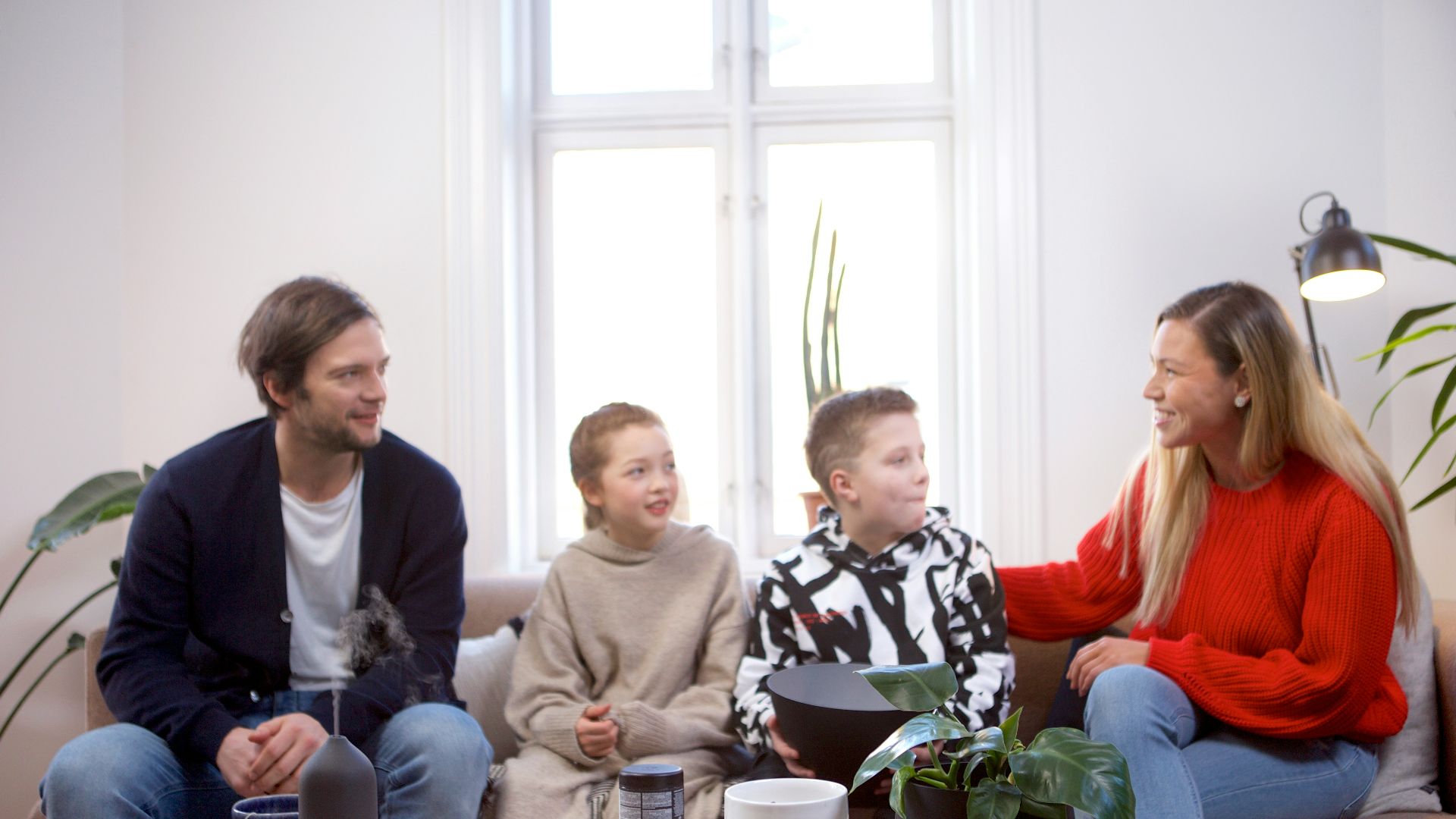 a group of people sitting around a table
