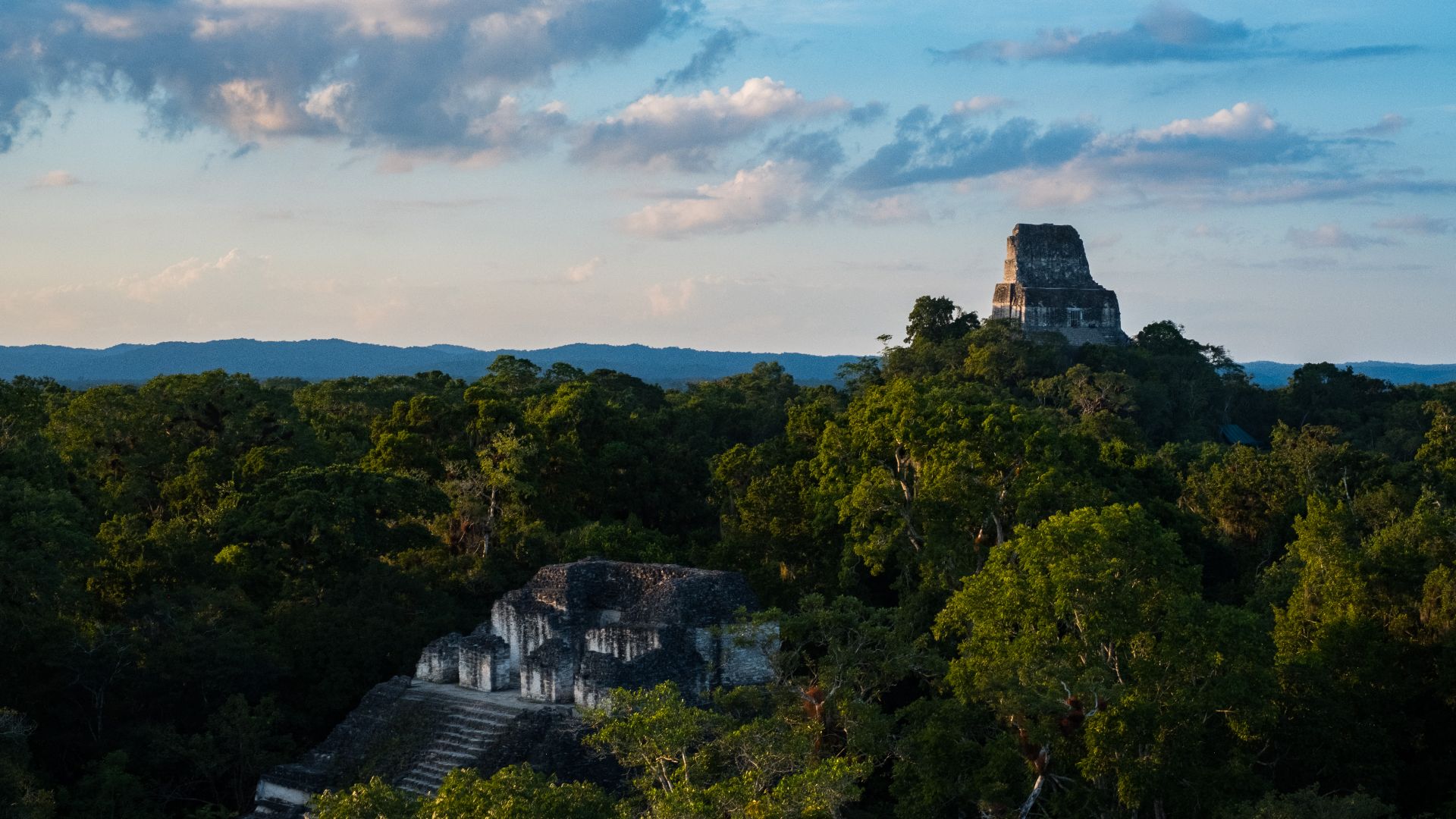 December 2017. Temples in Tikal National Park at sunset. Tikal, Guatemala. Photograph by Jason Houston for USAID