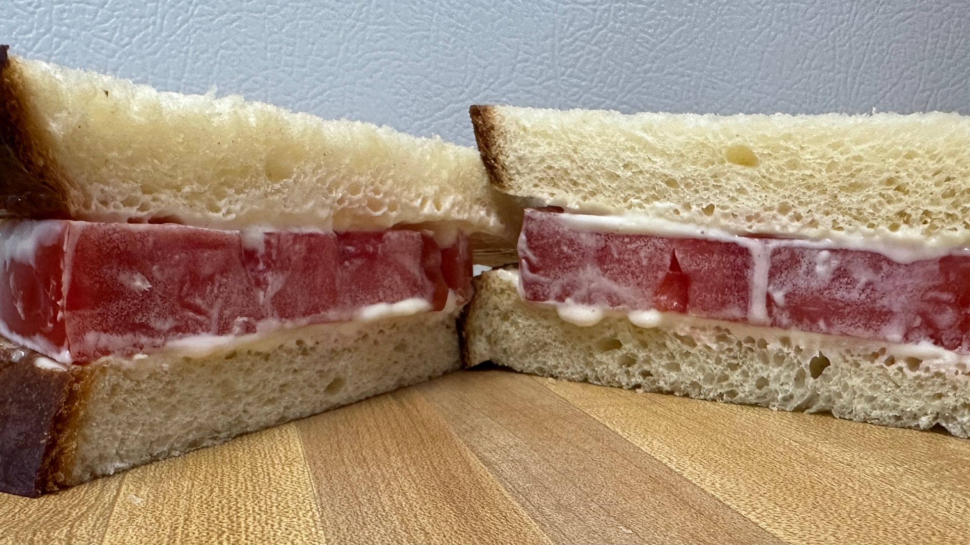 Southern-style tomato sandwich, sliced open